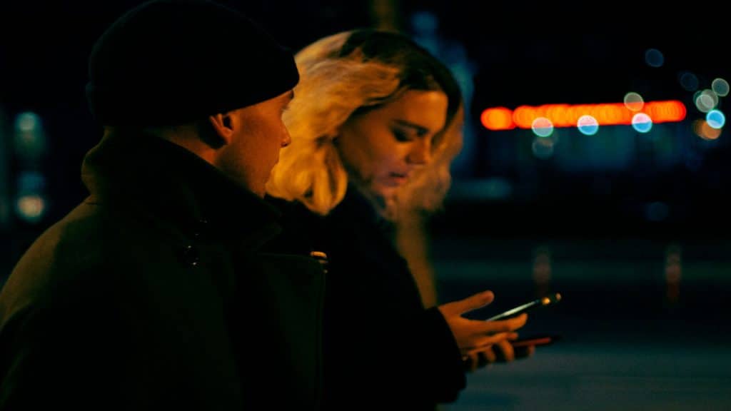 couple texting with uncertainty