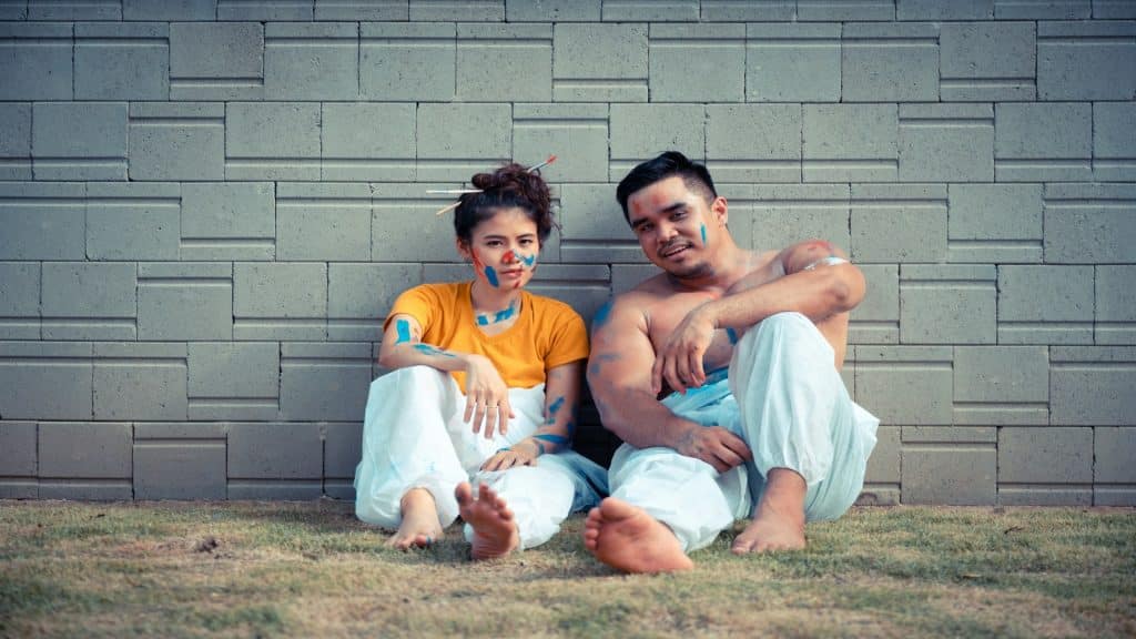 man sitting calmly with partner