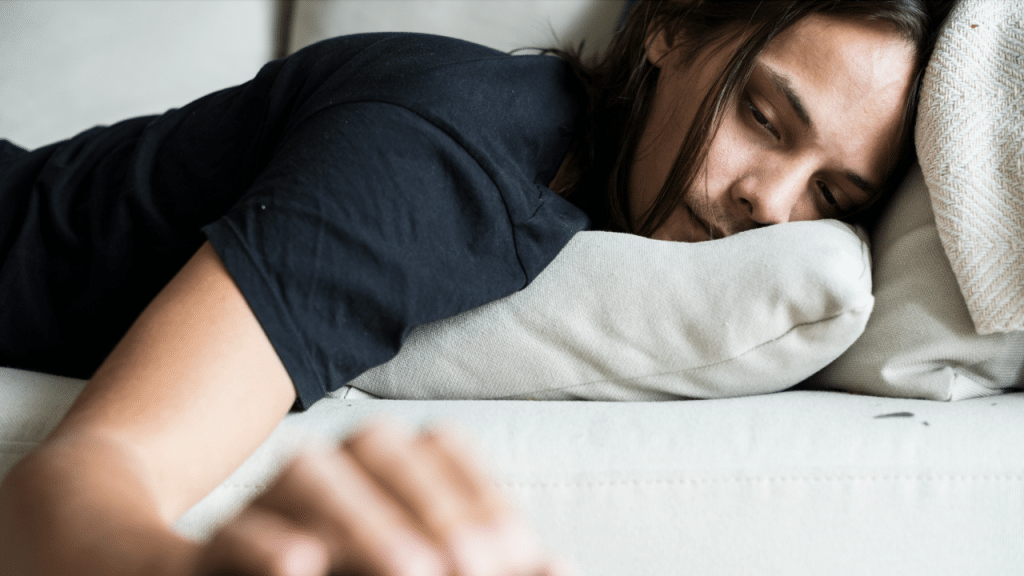 A woman sleeping on the couch