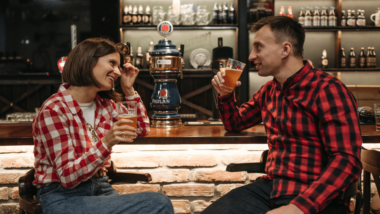 A couple having beer during a date