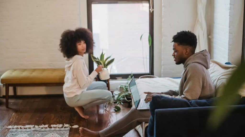 A couple relaxing at home