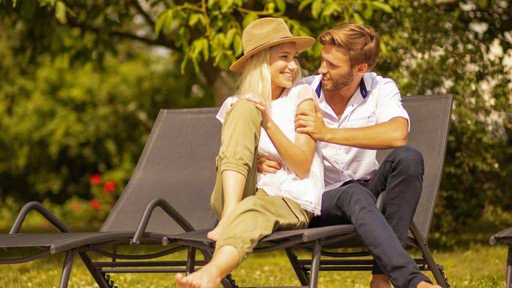 A couple relaxing and smiling together