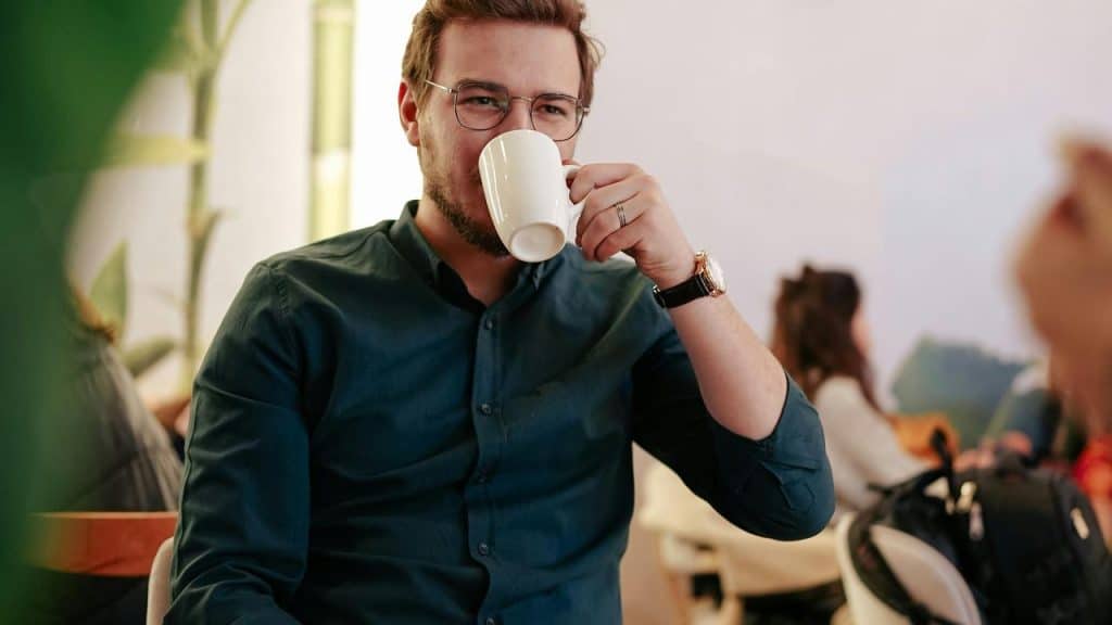 A man drinking coffee