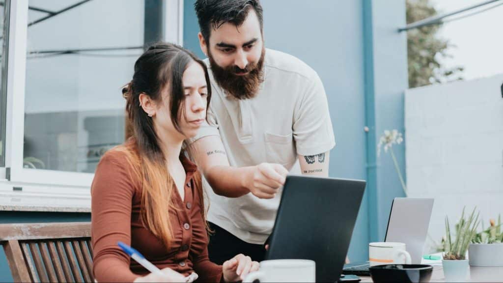 A man helping a woman