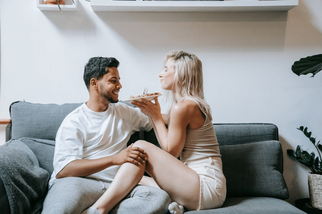 A couple sitting on a couch