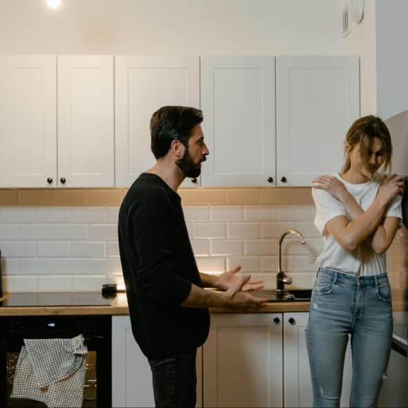 A man confronting a woman