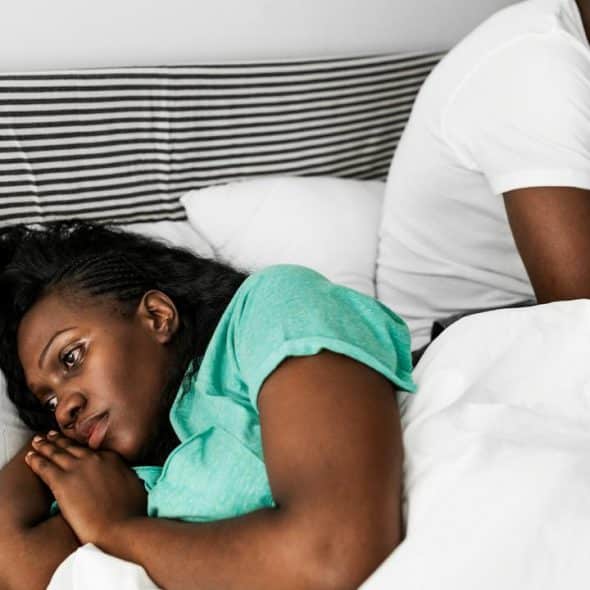 A couple ignoring each other
