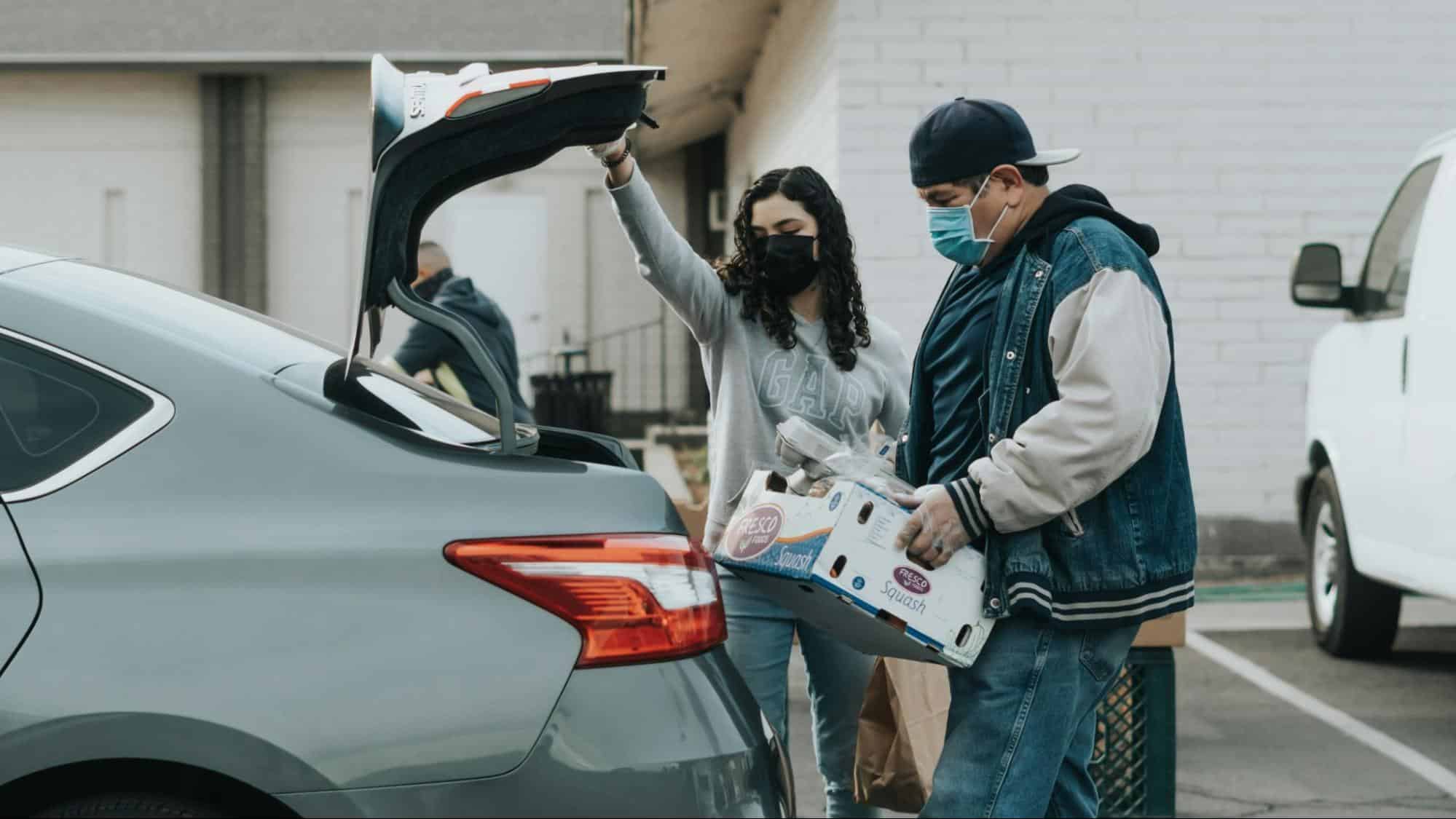A man helping a woman