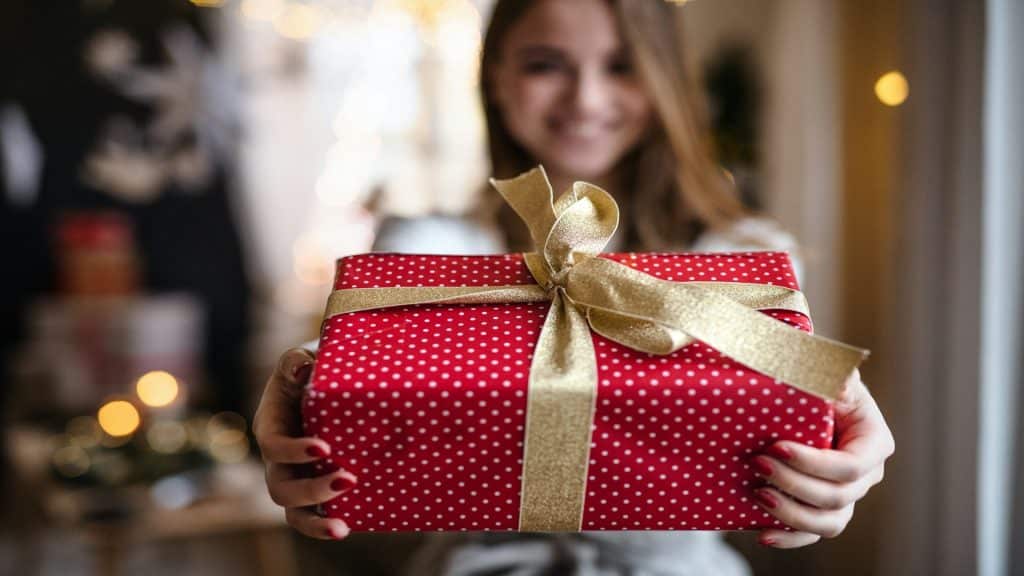 woman giving thoughtful gift