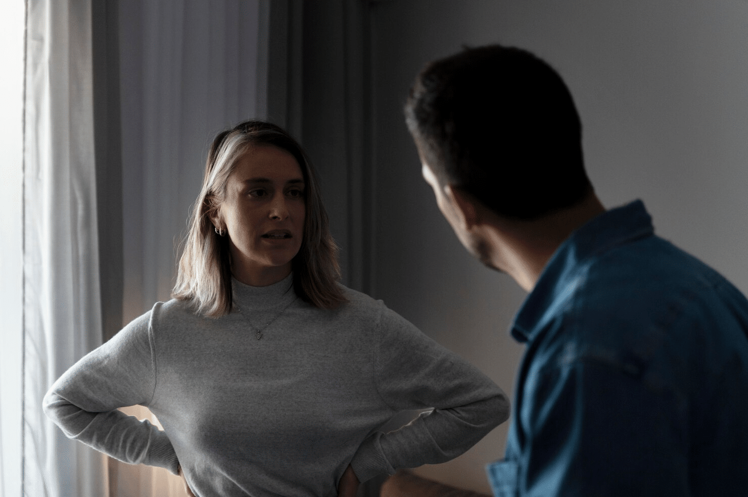 A man and woman talking