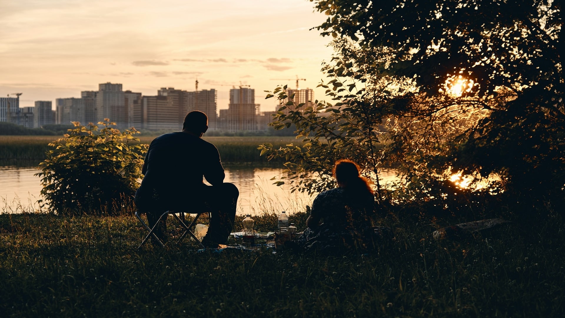 couple watching sunset together