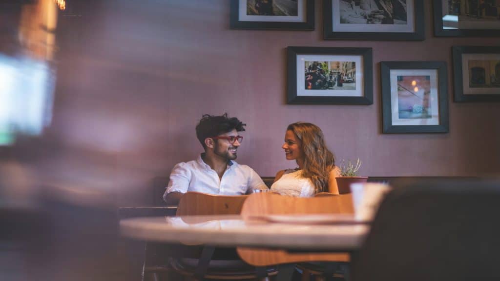 couple smiling during conversation