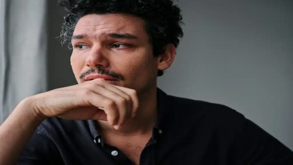 man sitting thoughtfully