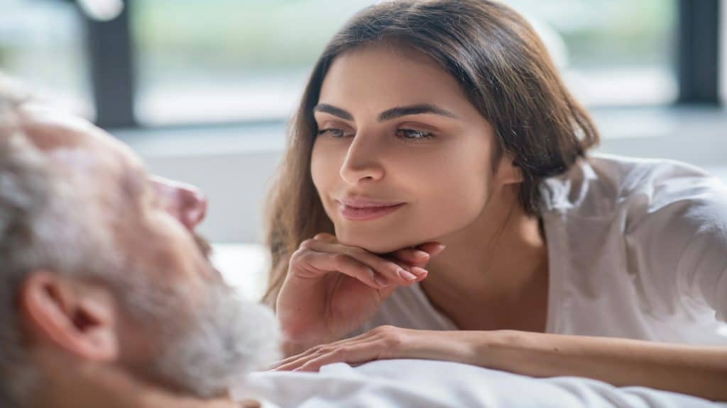 woman listening attentively to man