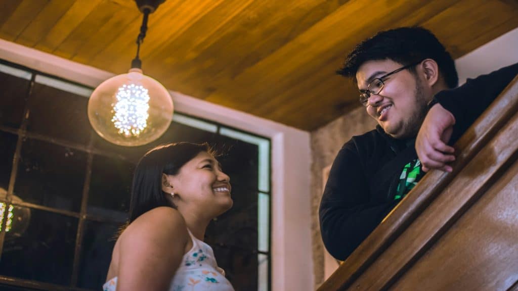 couple laughing during light conversation