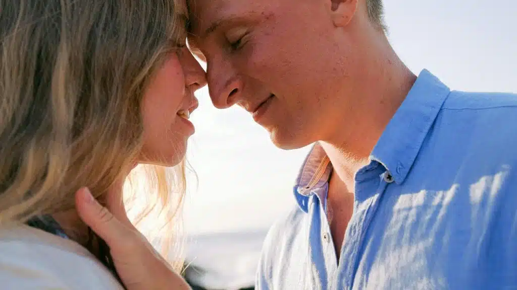 A couple touching foreheads