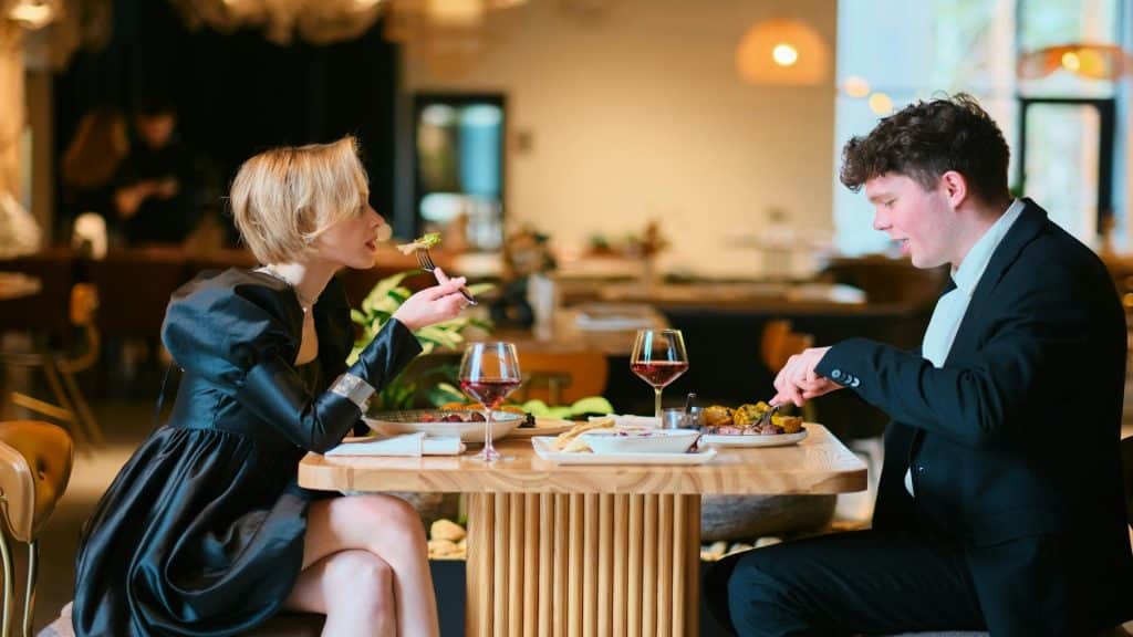 couple talking calmly at table