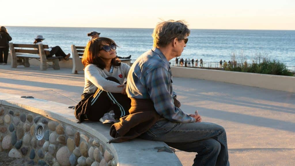 couple sitting apart in serious mood