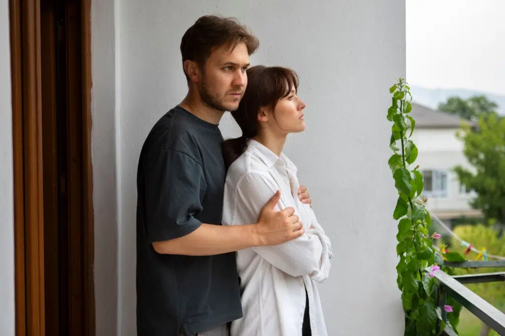 Unhappy couple looking outdoors