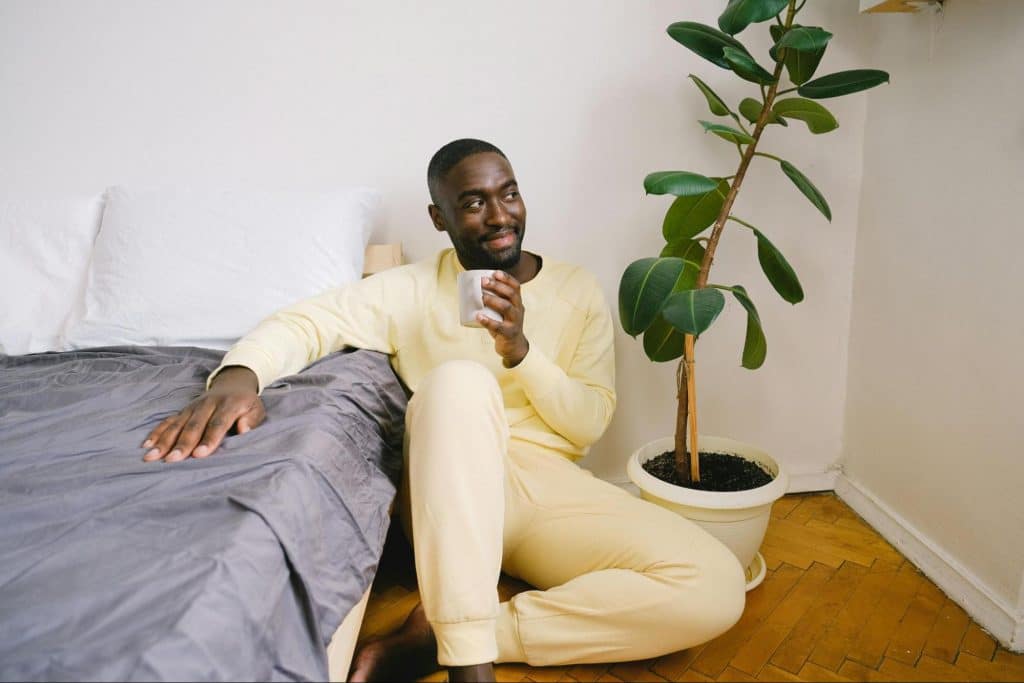 A man sitting on the floor