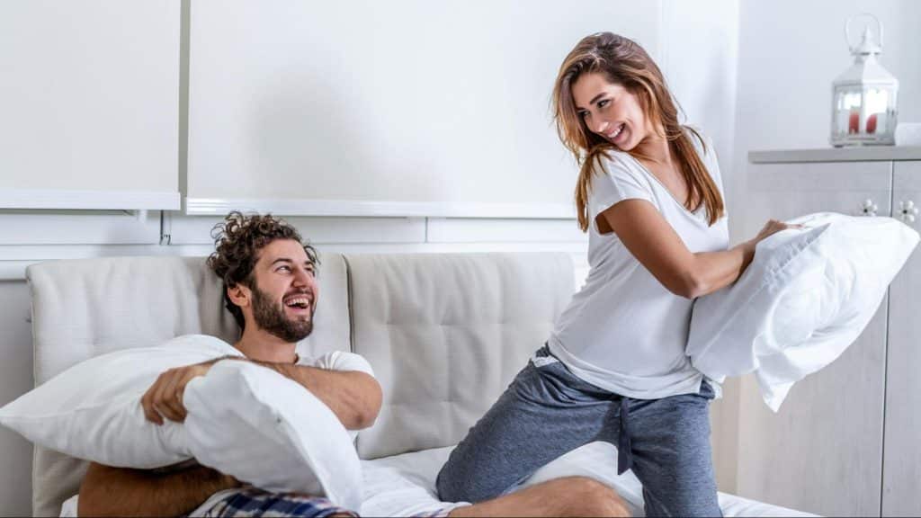Woman being playful with a man