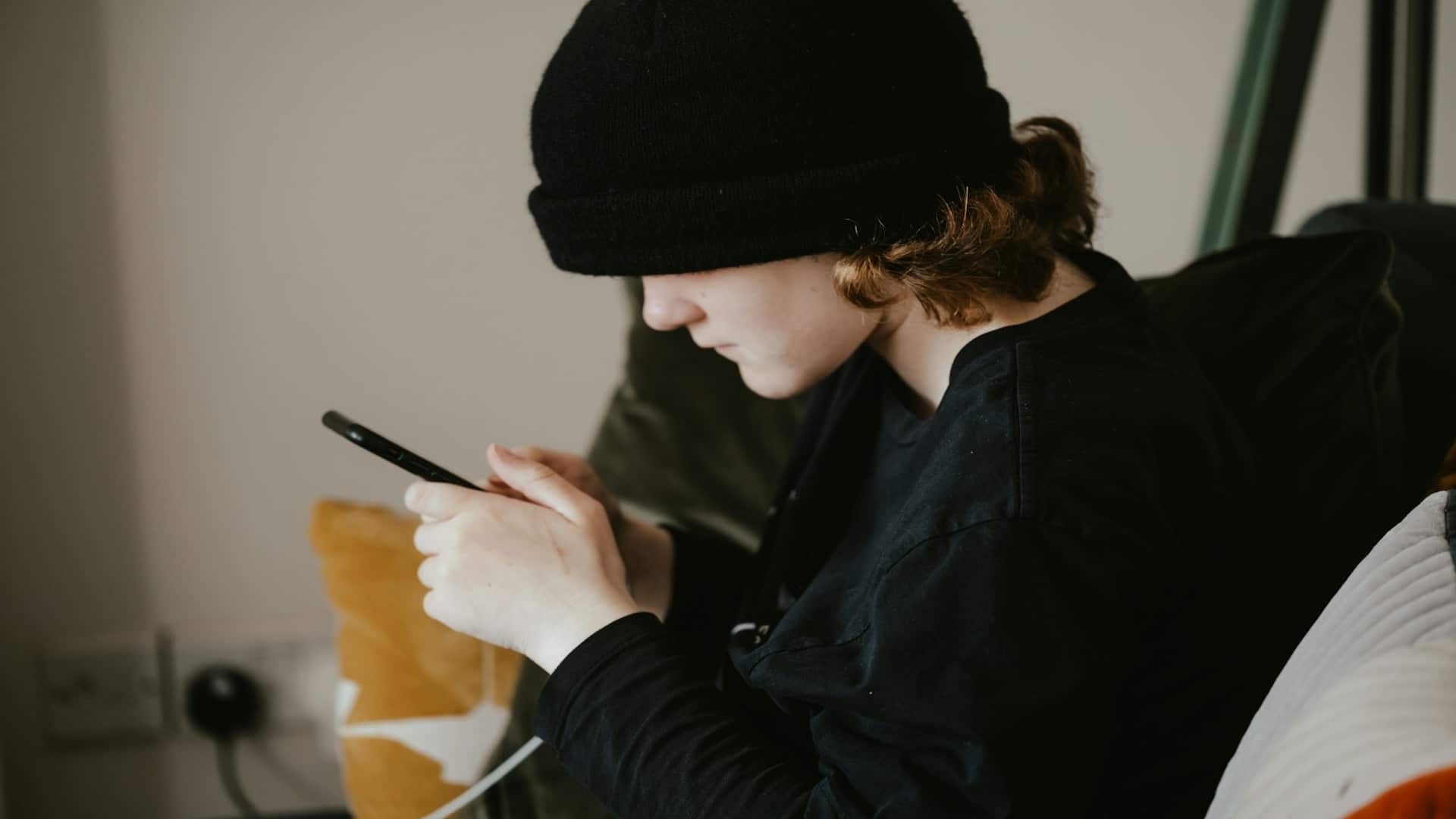 person texting on phone