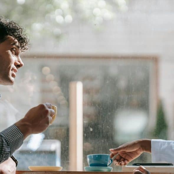 A man and woman talking