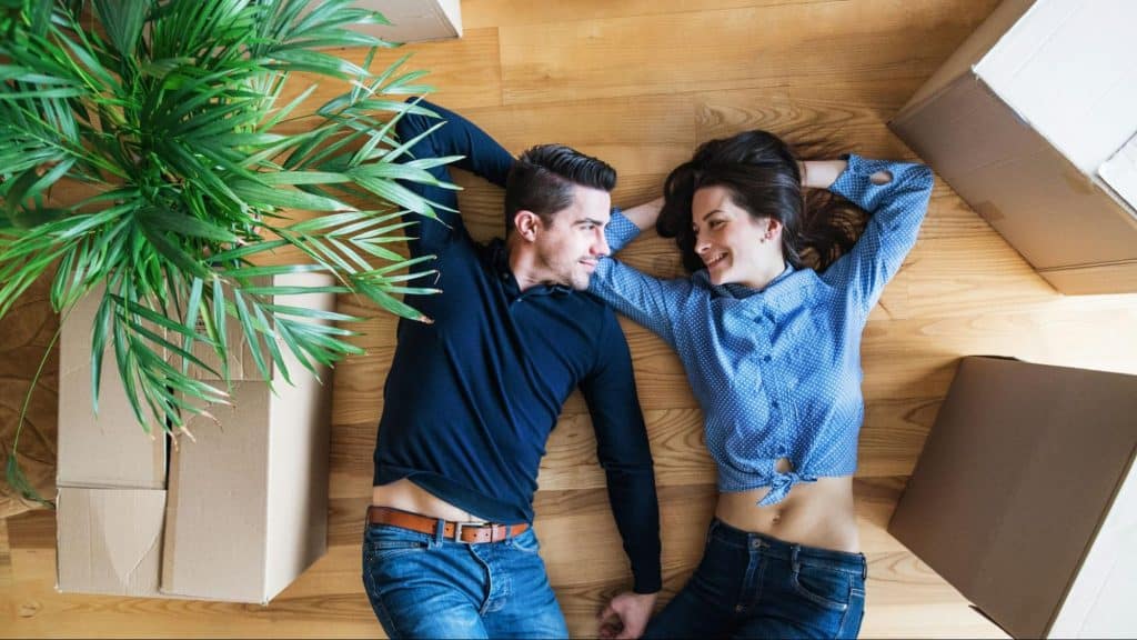 A man and woman on the floor 