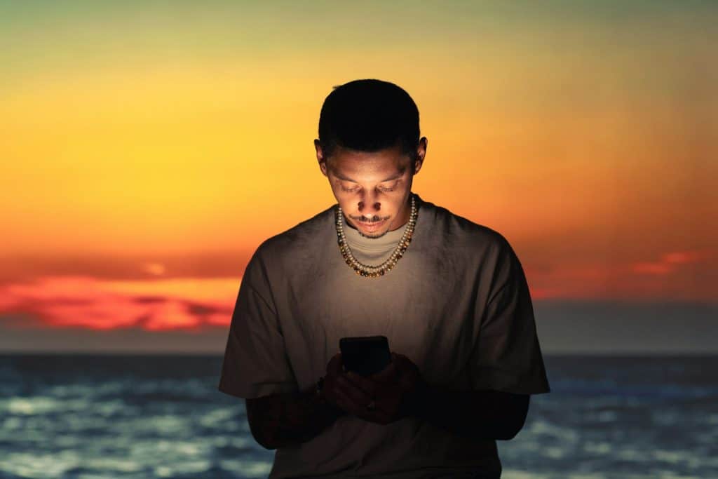 thoughtful man texting
