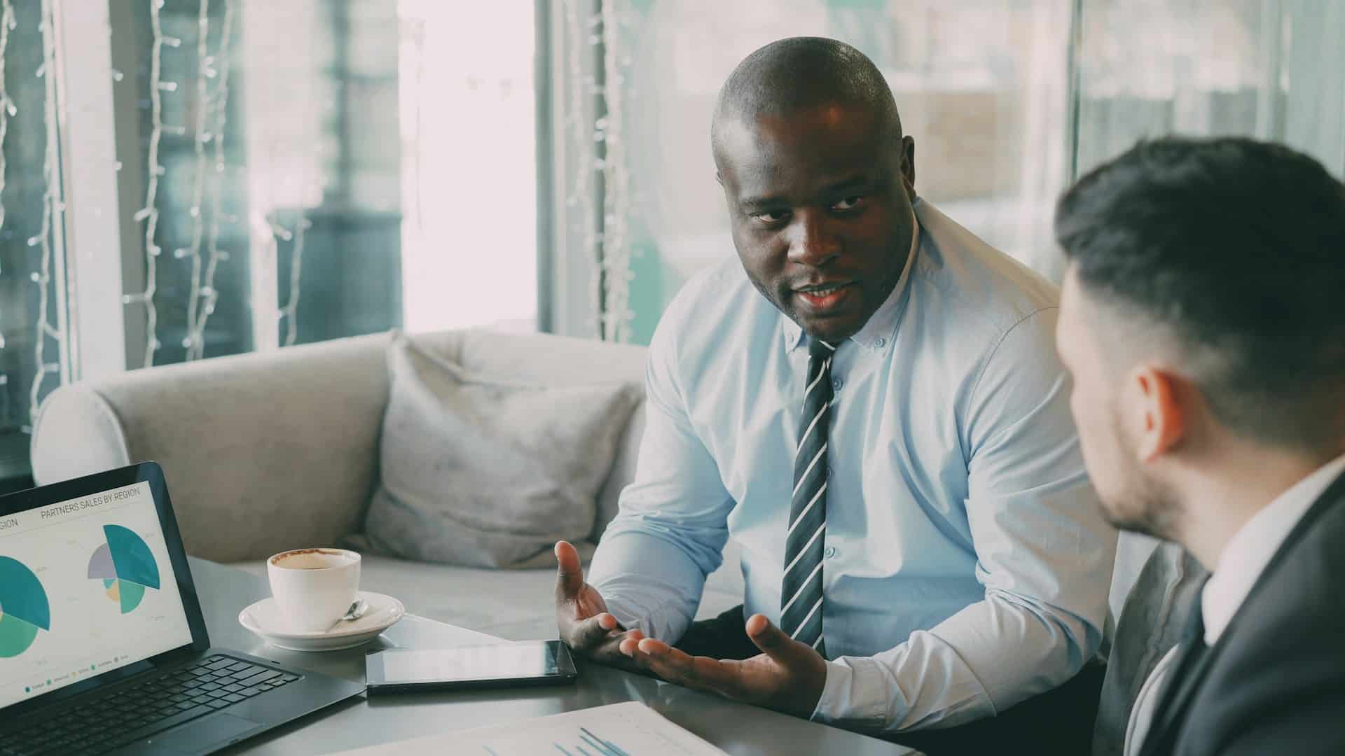 man planning finances on laptop