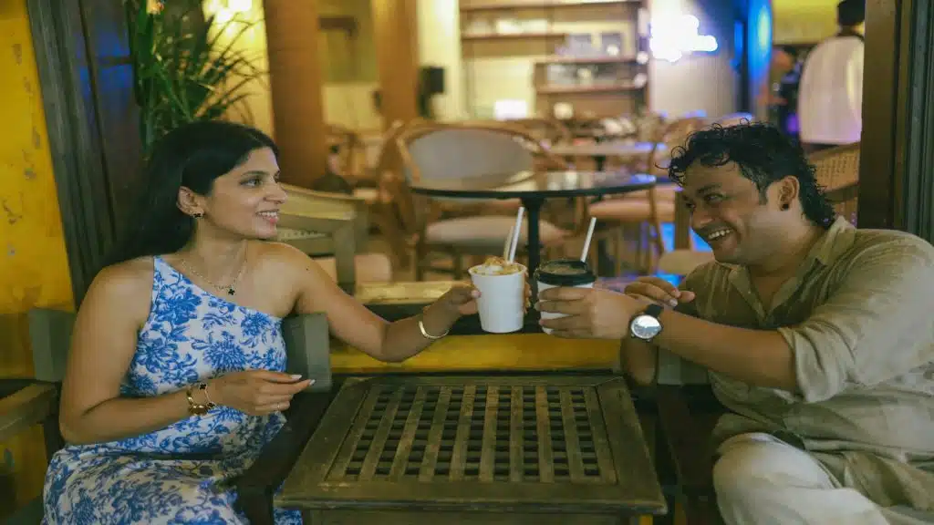 couple talking comfortably at café table