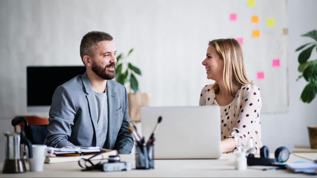 A man and woman talking