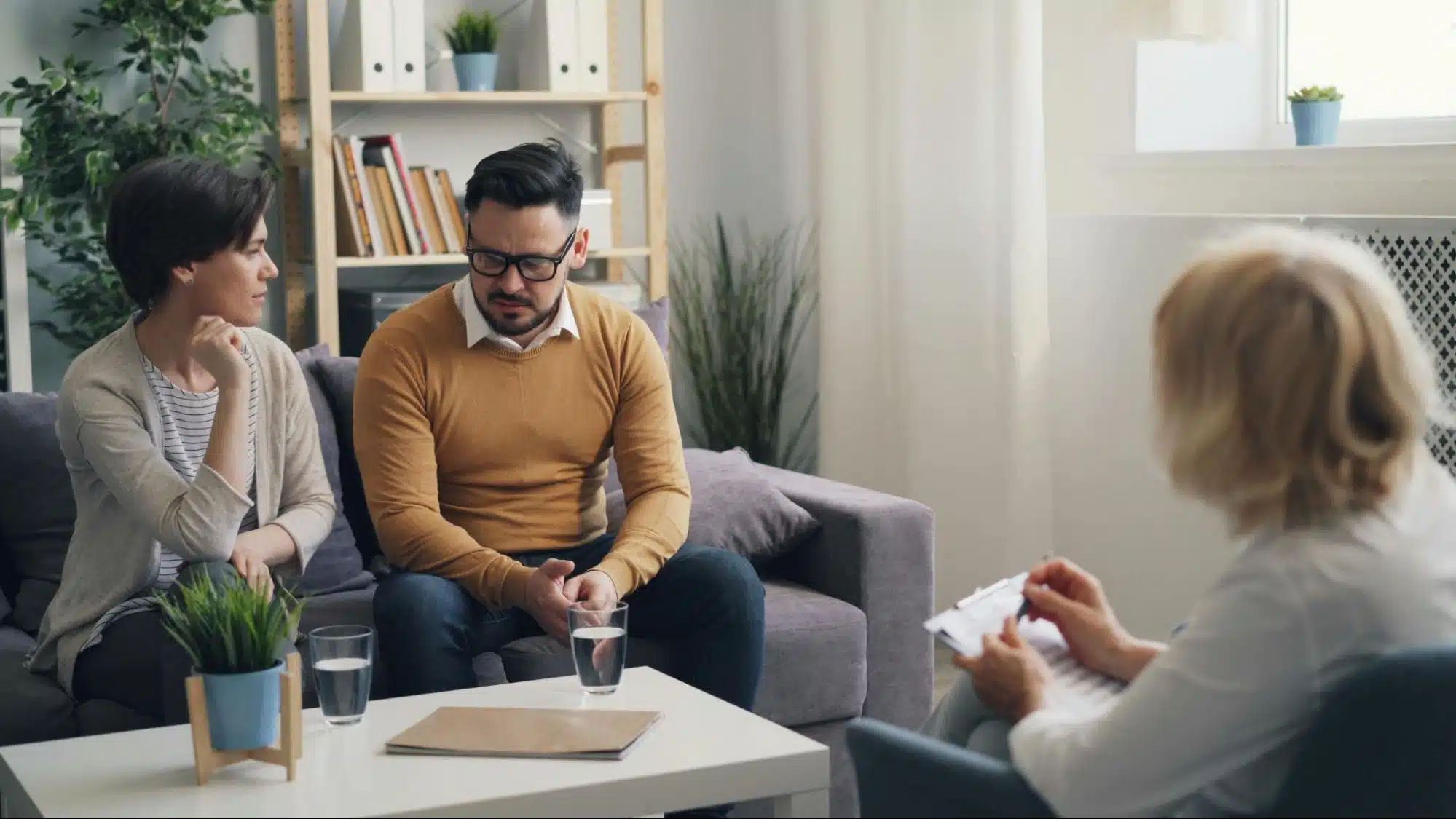 A woman talking to a man