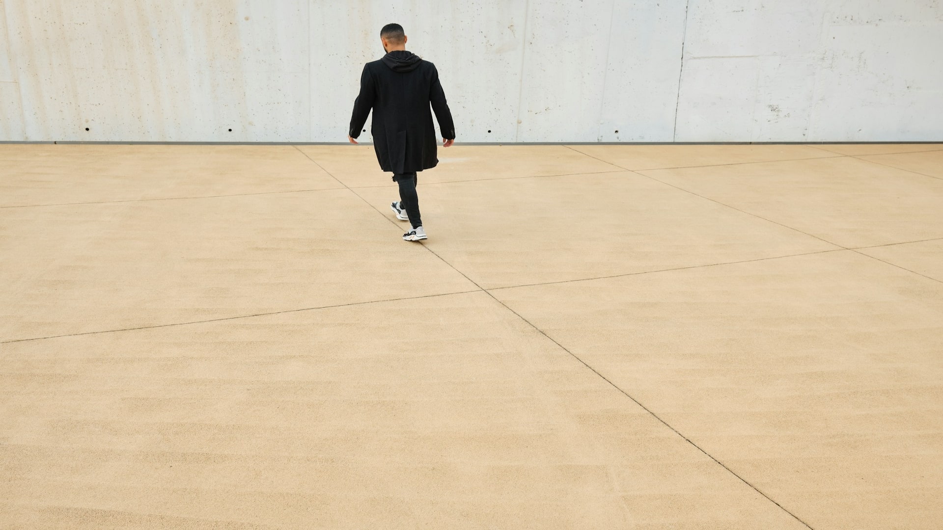 man walking alone outdoors