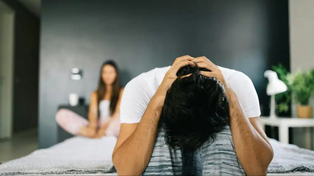 A man and woman not talking to each other
