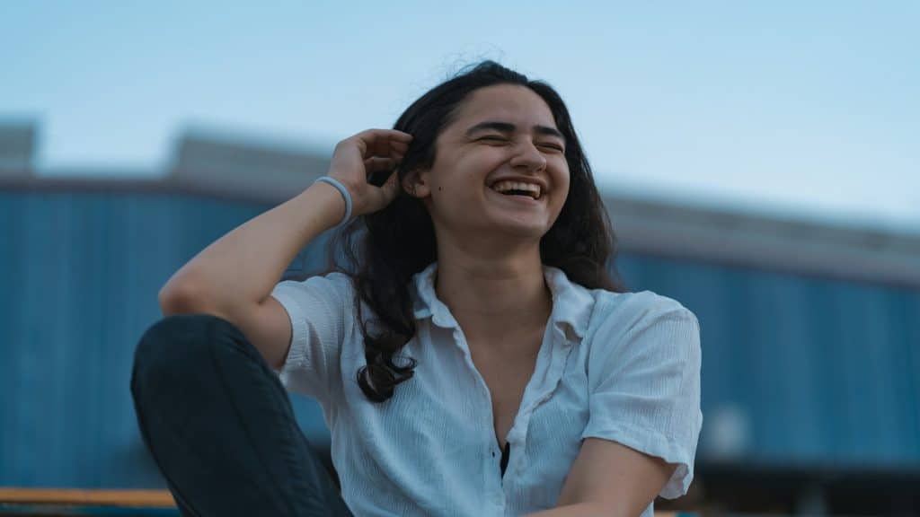 woman smiling during relaxed moment