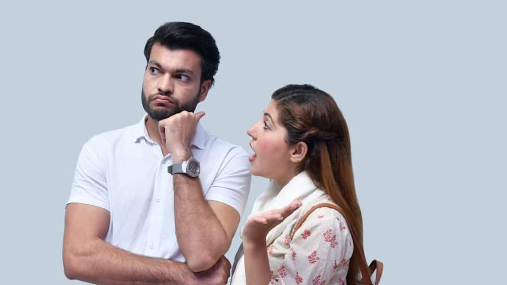 A woman nagging a bearded man.
