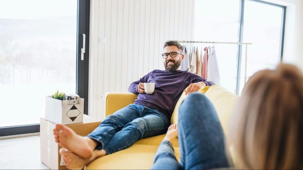 A man smiling to woman 