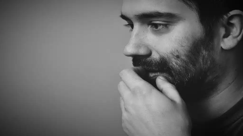 man thinking quietly