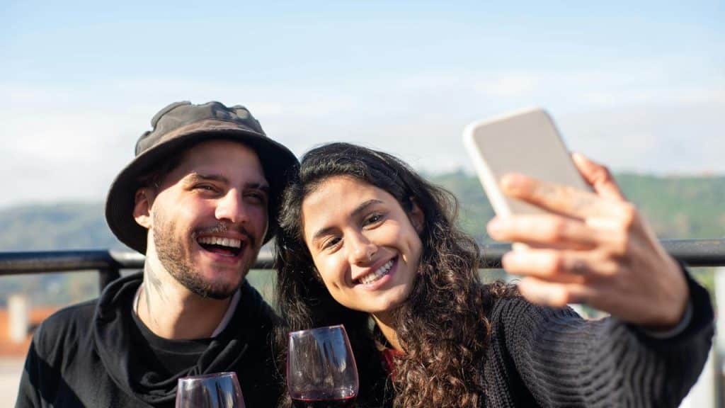 A smiling couple taking a selfie