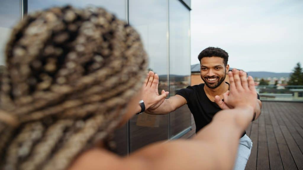 man showing small supportive gesture