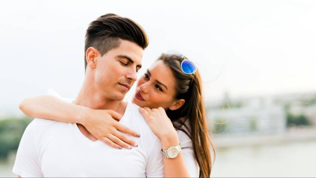 Woman hugging a man