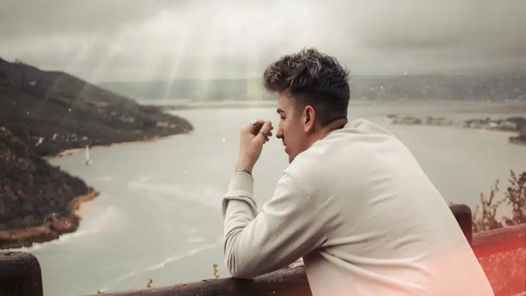 man reflecting on past moments