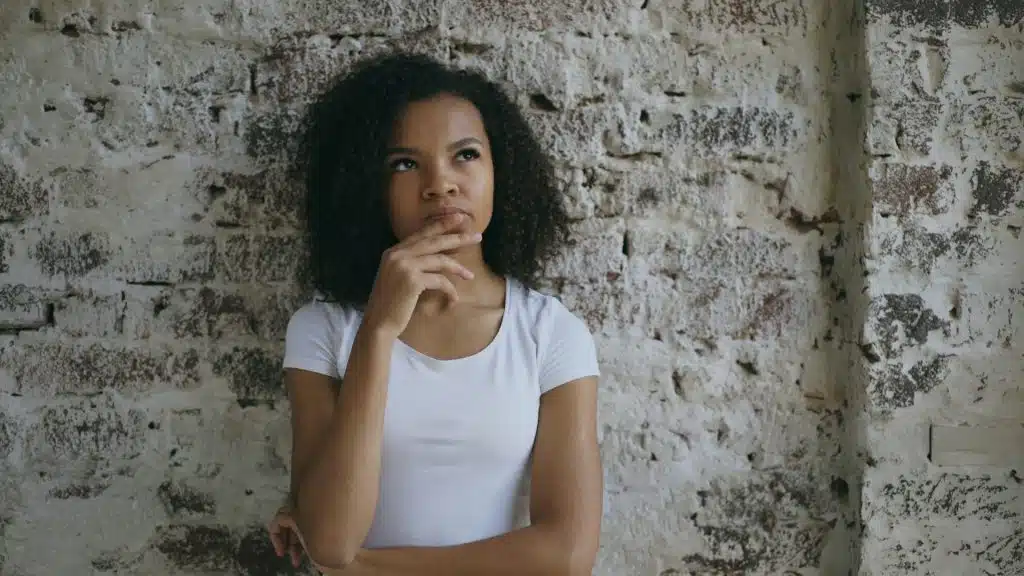 person questioning their thoughts