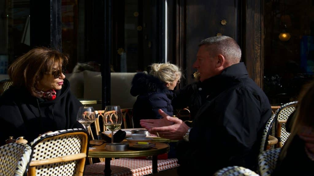 couple discussing seriously at table