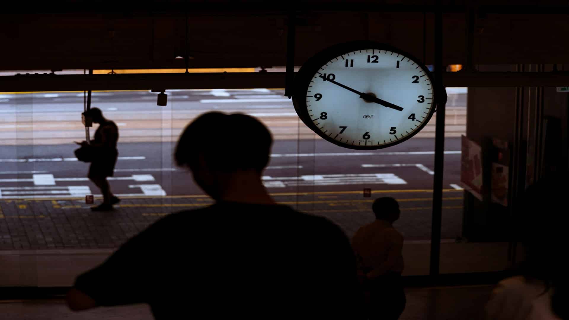 man arriving on time outdoors