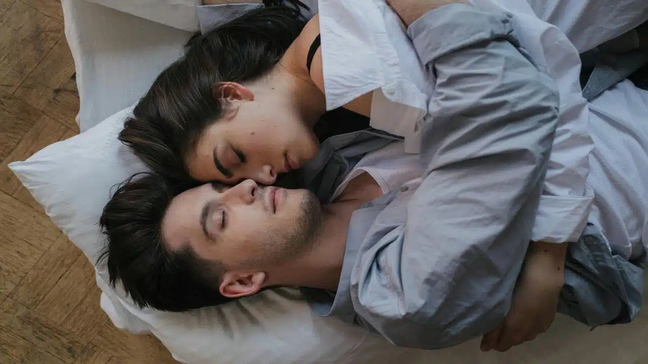 A couple cuddling at home