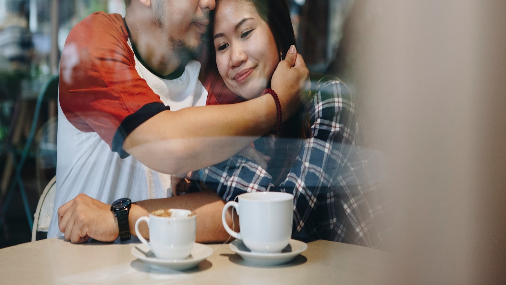 couple sitting together having calm conversation