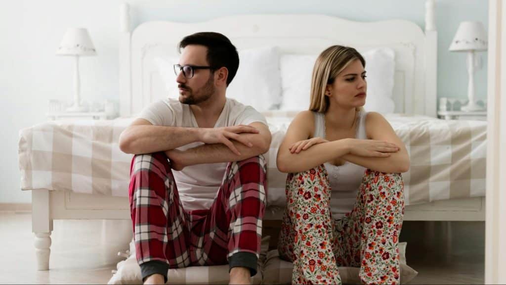 A man and woman not talking to each other