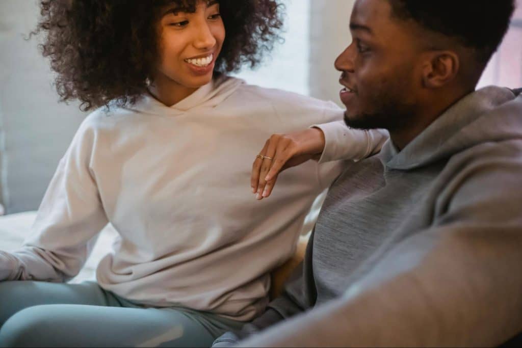 A man and woman talking 